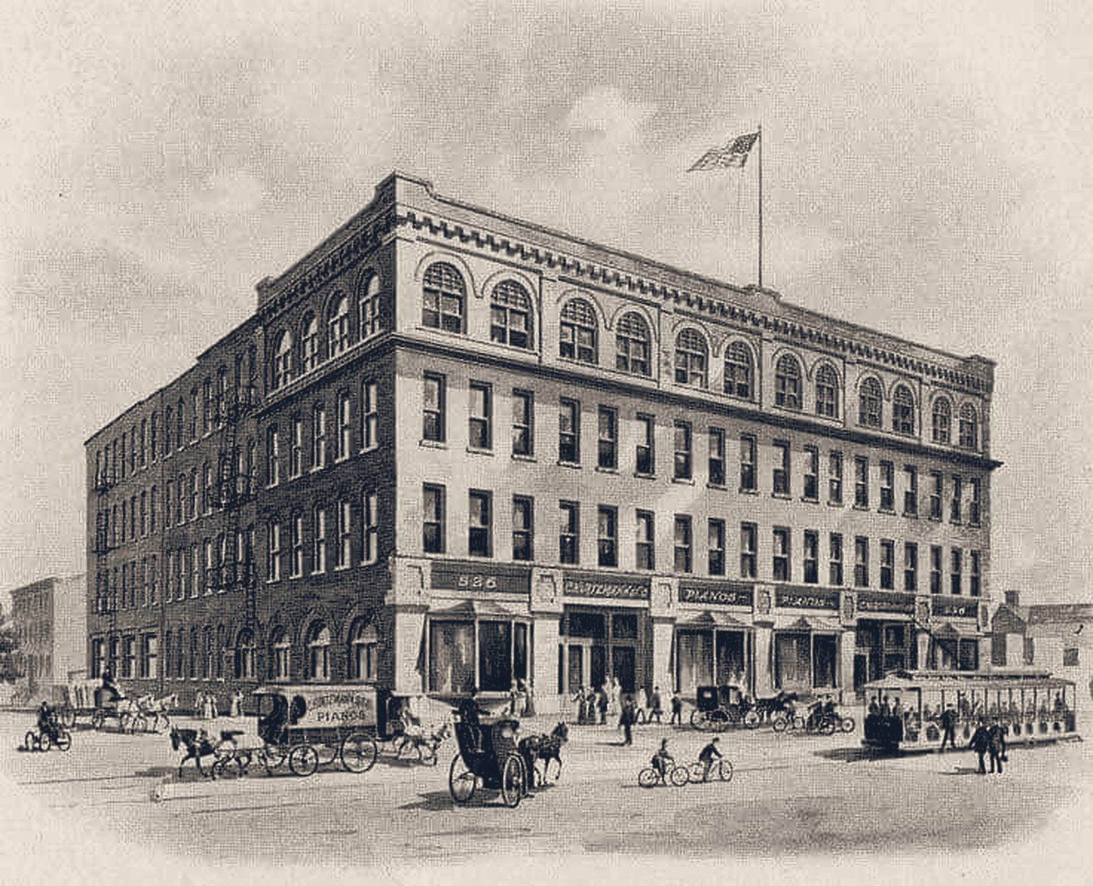 Engraving of the Kurtzmann piano factory at 526 Niagara Street in 1899, with horse carriages and a streetcar on Niagara Street